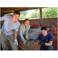 55_Bosque_team_laying_brick-maybe.jpg